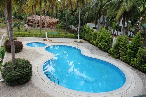 Resorts in Bangalore - The Gari Resorts Kanakapura Aerial View of Swimming Pool